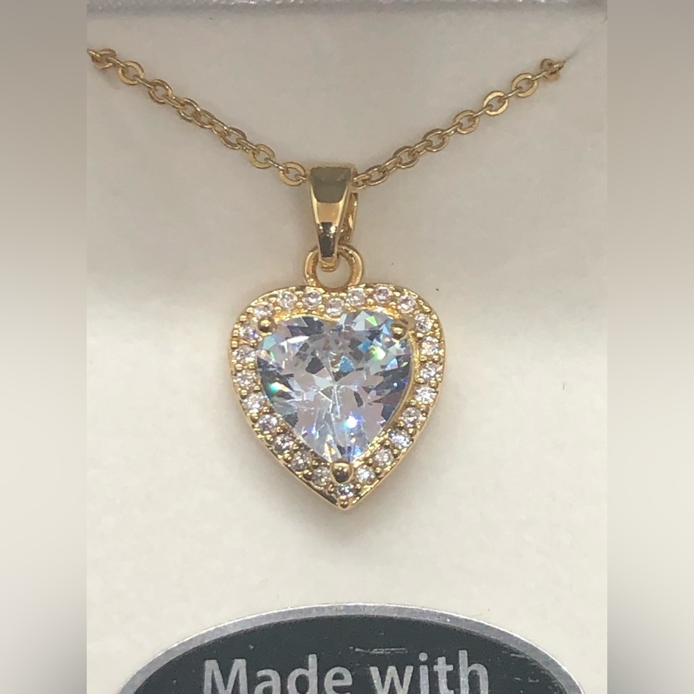 Swarovski Crystals heart shaped necklace. 16” chain w/2” adjustment gold plated